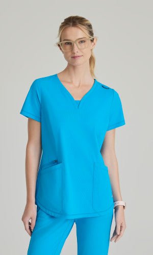 SKECHERS BARCO SLIP-INS 3 POCKET V-NECK TOP SKT220